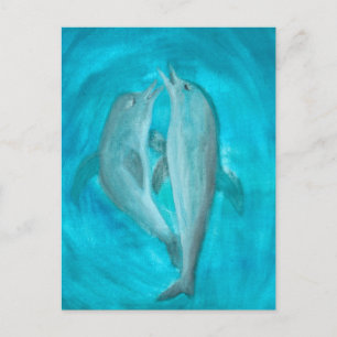 Zwei Delphine spielen frei und wild im Ozean Postkarte