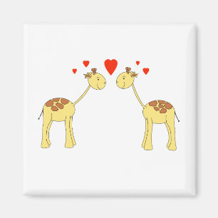 Zwei gegenüberstellende Giraffen mit Herzen. Magnet