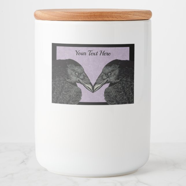 Zwei große schwarze Krähen an der Lila schwarzen G Lebensmitteletikett (Vorderseite)