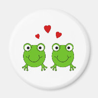Zwei grüne Frösche mit roten Herzen.