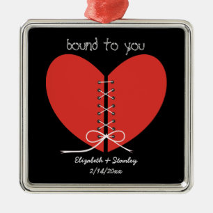 Zwei Hälften eines Herzens, verbunden mit einem Fa Silbernes Ornament