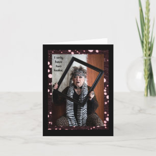 Zwei humorvolle Blicke: Trophäe Ehefrau oder Troll Karte