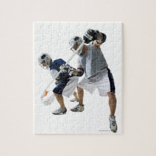 Zwei junge Männer, die Lacrosse spielen Puzzle