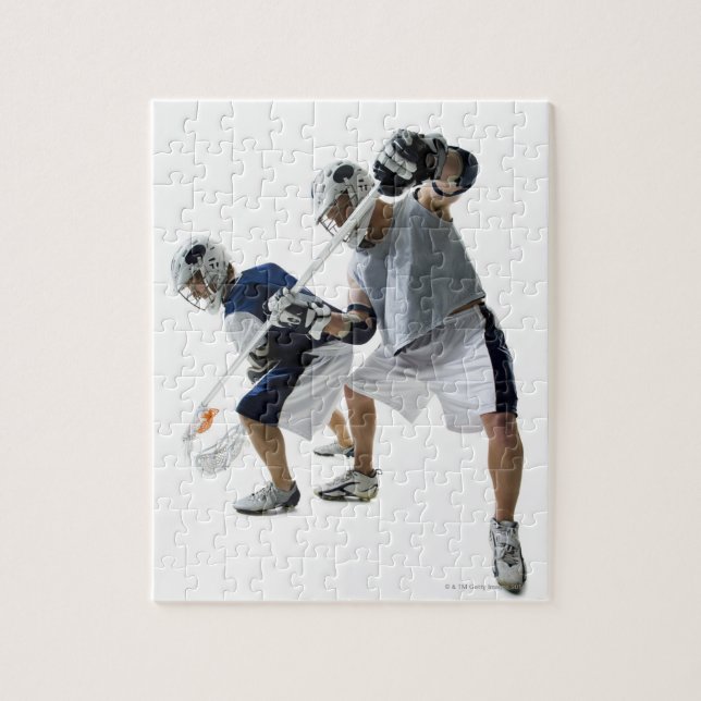 Zwei junge Männer spielen Lacrosse Puzzle (Vertikal)