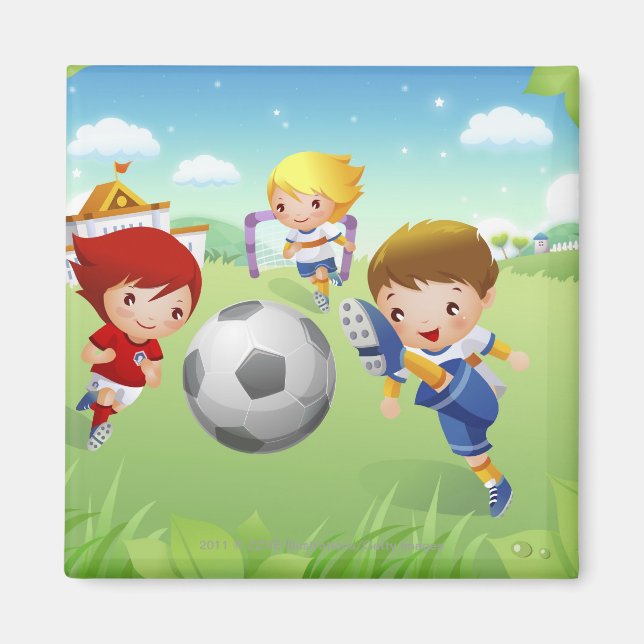 Zwei Mädchen und ein Junge spielen Fußball Magnet (Vorne)