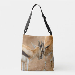 Zwei männliche Impala kämpfen. Afrika, Tragetaschen Mit Langen Trägern