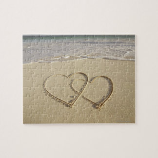 Zwei Oberherzen gezeichnet am Strand Puzzle