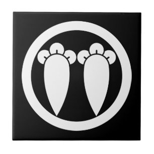 Zwei parallele Nelken in einem Kreis Fliese