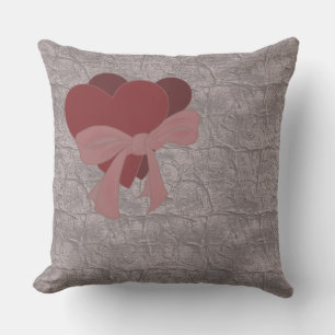zwei rote Herzen und ein Bogen für Valentinstag Th Kissen