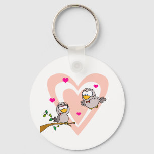 Zwei Schildkröte-Tauben durch eine Niederlassung Schlüsselanhänger