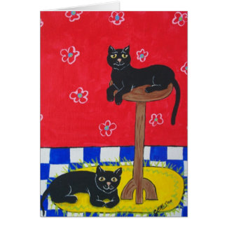 Zwei schwarze Katzen