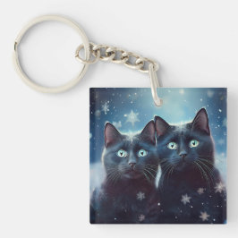 Zwei schwarze Katzen werden angeschneit Schlüsselanhänger