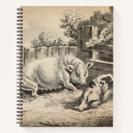 Zwei Schweine, die in Strohhalm in einem Außengebl Notizbuch