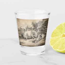 Zwei Schweine, die in Strohhalm in einem Außengebl Schnapsglas