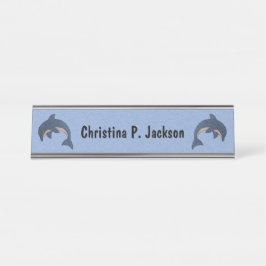 Zwei Springschwellen wie blaue weiße Delphine Schreibtischnamensplakette