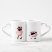 zwei Vögel auf einer Tasse