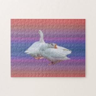 zwei weiße Gänse in farbigem Hintergrund Puzzle
