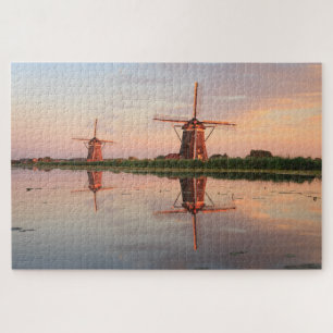 Zwei Windmühlen mit Reflektion bei Sonnenuntergang Puzzle