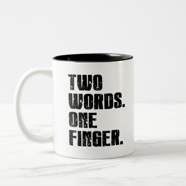 Zwei Worte: ein Finger Zweifarbige Tasse (Links)