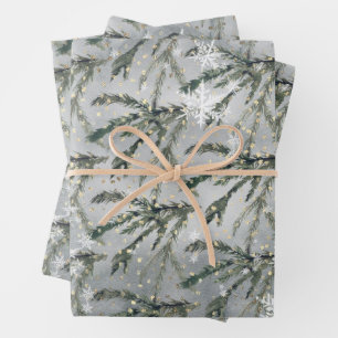 Zweigstelle des grauen Winterspruce unter dem gold Geschenkpapier Set