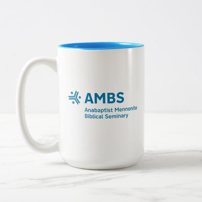 Zweitönige Tasse mit AMBS-Logo (Links)